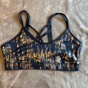 JoyLab Black and Gold Patterned Sports Bra